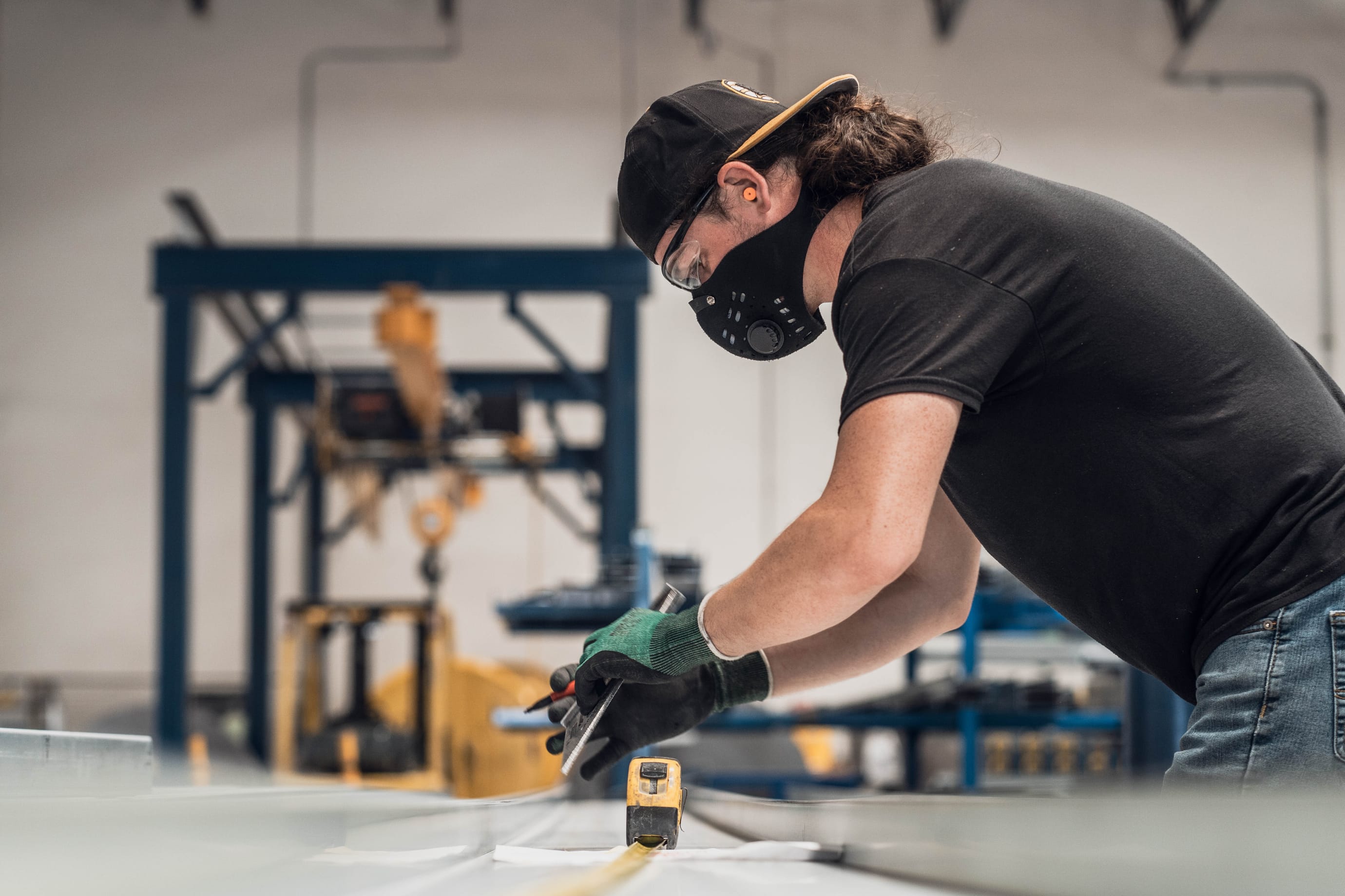 DBC employee with protective face mask