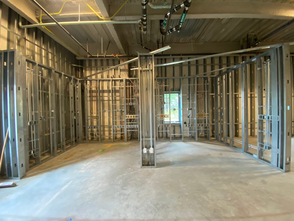 DBC prefabricated interior panel system in Baystate Medical Center patient room (showing electrical and medical gas rough-in)