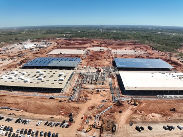 Landscape picture of rural jobsite with two data centers