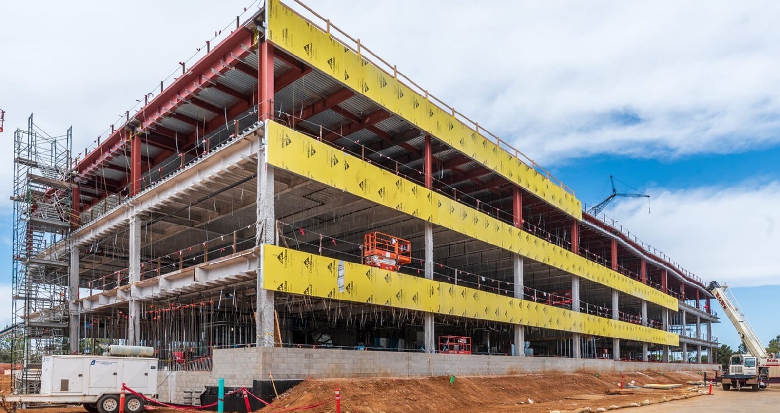 Side view of Takeda California Inc under construction and during prefabricated panel installation