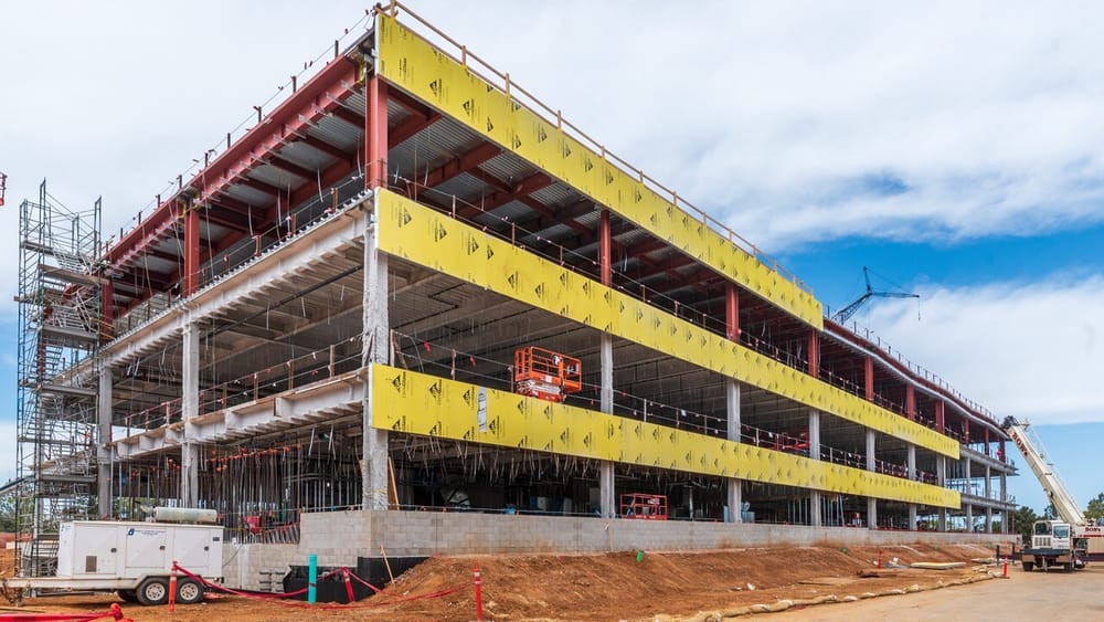 Side view of Takeda California Inc under construction and during prefabricated panel installation