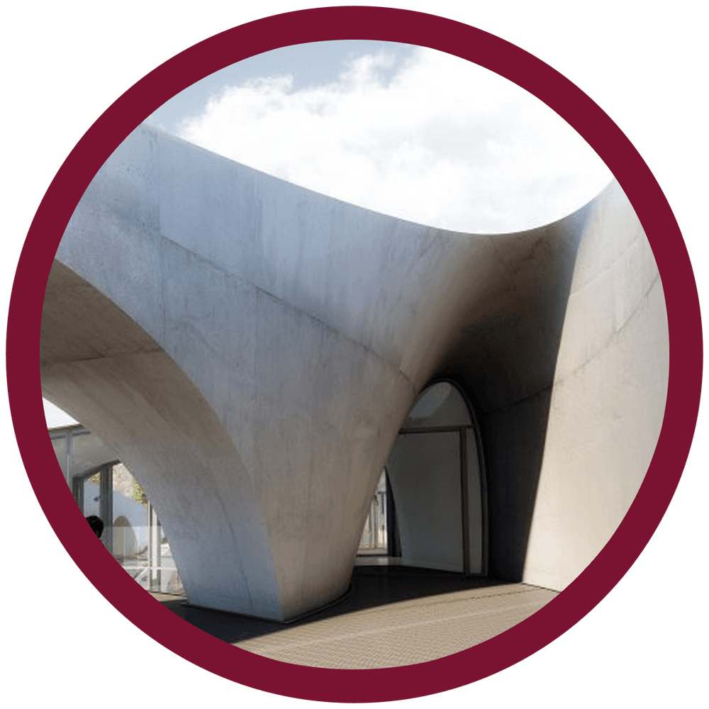 a rendering of the outside of a concrete with two kids playing under the concrete bridge in a marroon circle