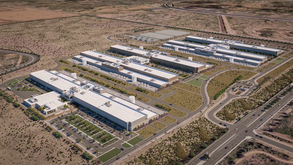 An ariel rendering view of 5 buildings in the middle of the desert
