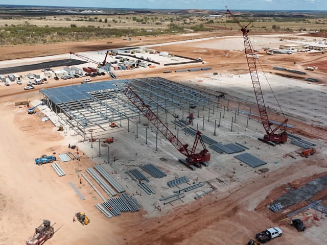 An ariel view of the steel frame for a building being constructed