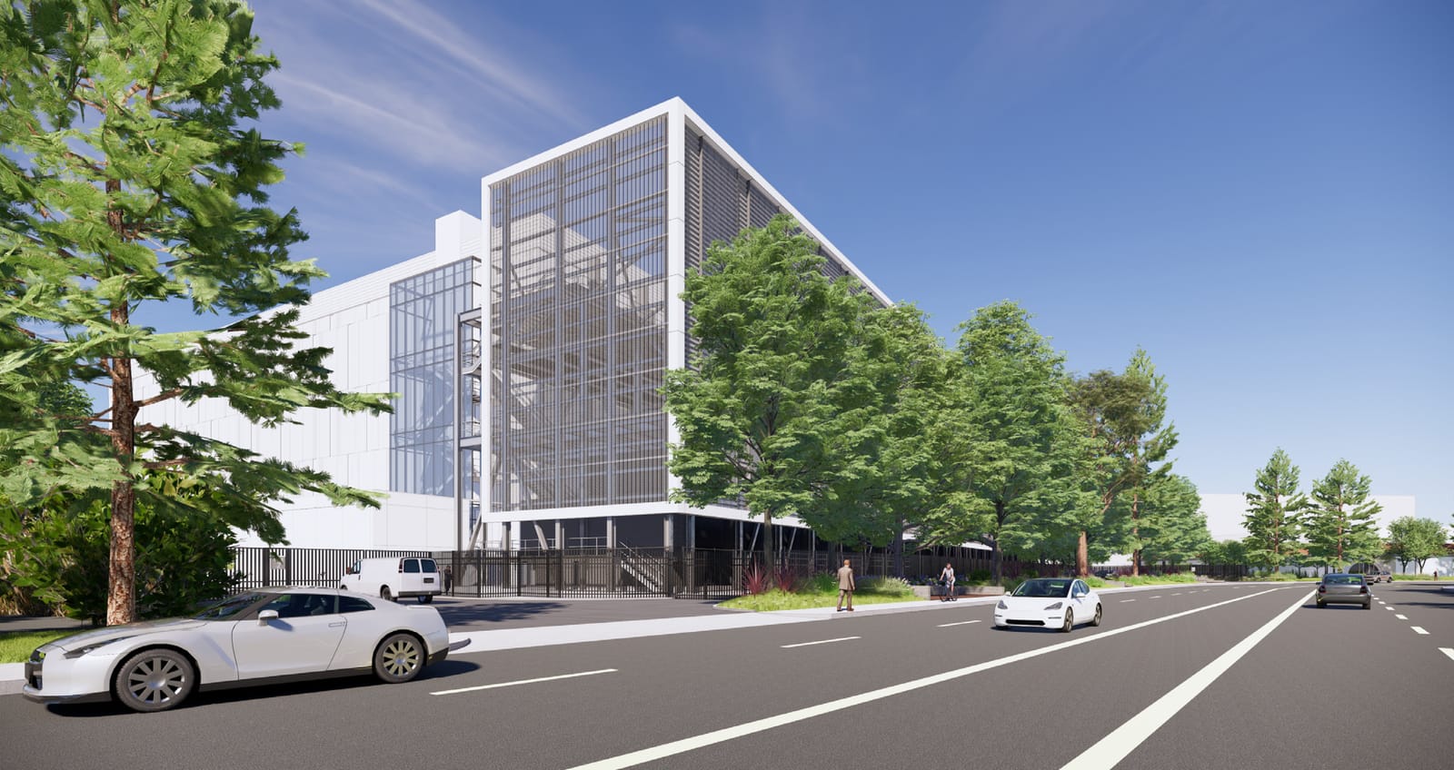 Model street view of a 4 story building with cars driving by