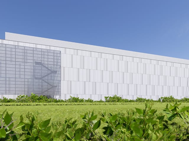 Model rendering of a 4 story grey building from the outside
