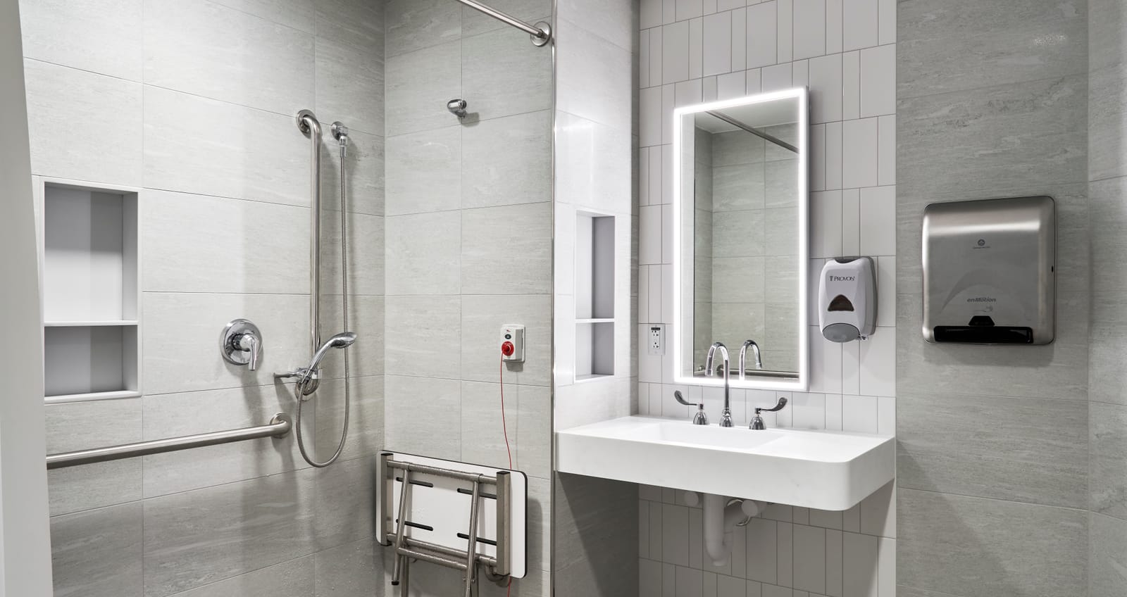 Atrium Health Carolinas Rehabilitation Bathroom Pod Interior Including sink, mirror, and shower