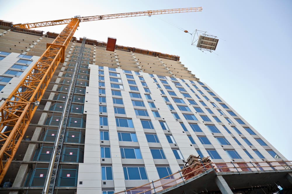 bathroom pod lifted and flying into high rise building