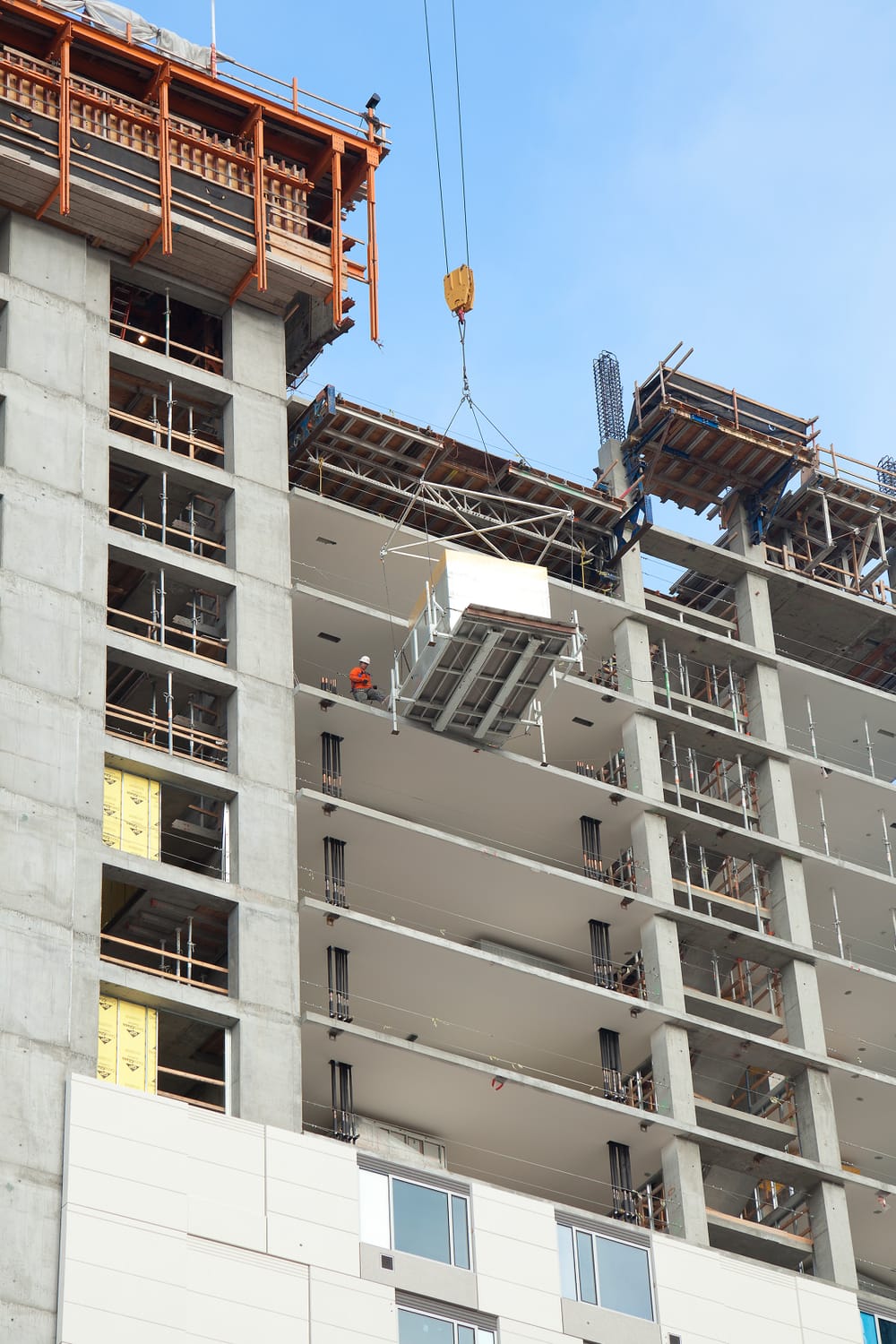 High rise hotel with bathroom pod being installed