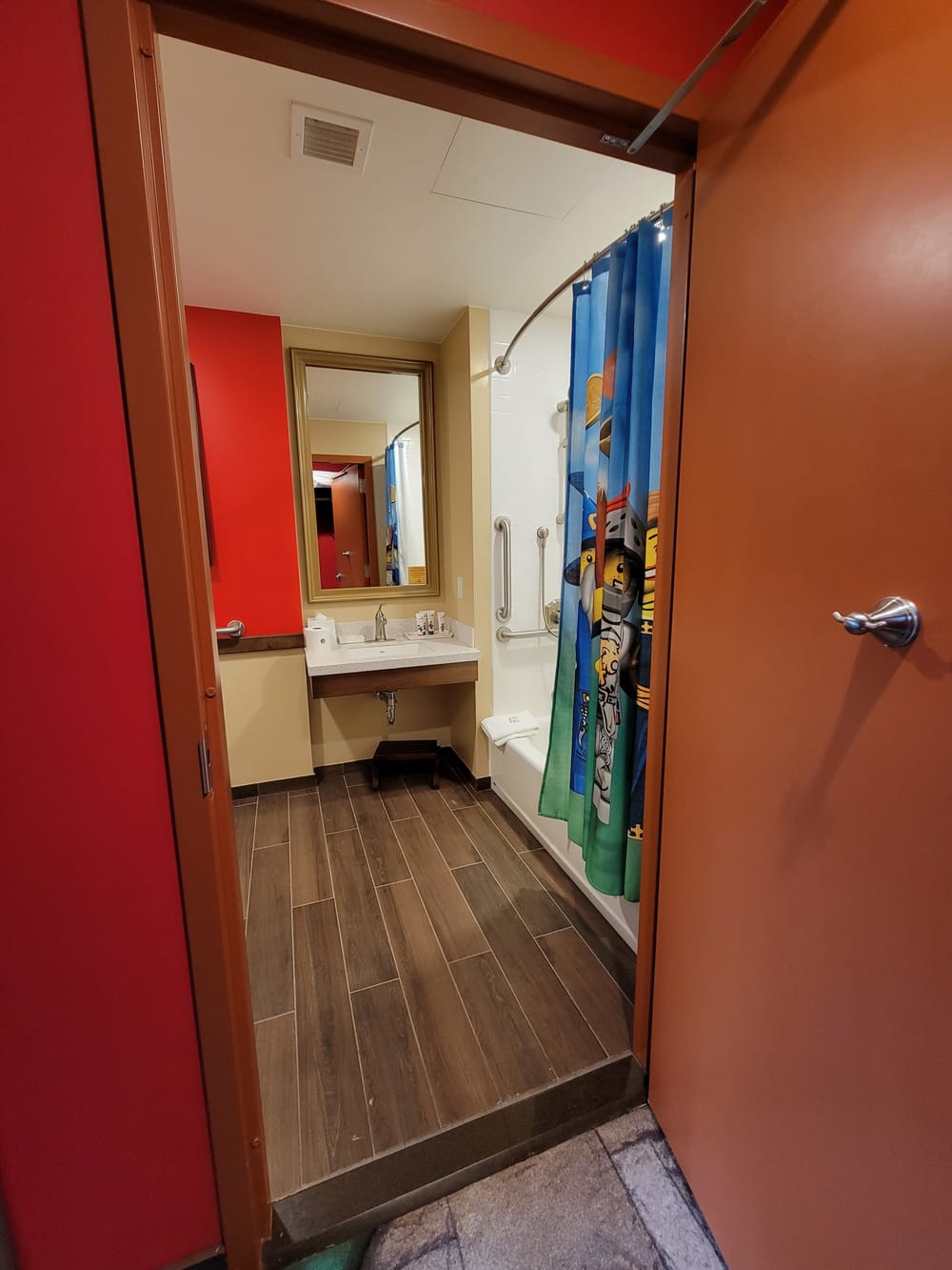 Picture of colorful bathroom with red walls