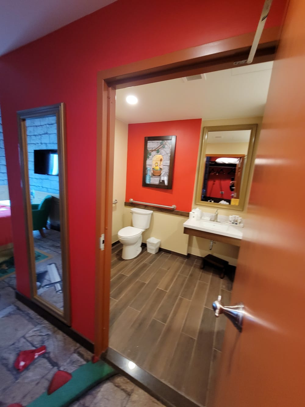 Picture of colorful bathroom with red walls