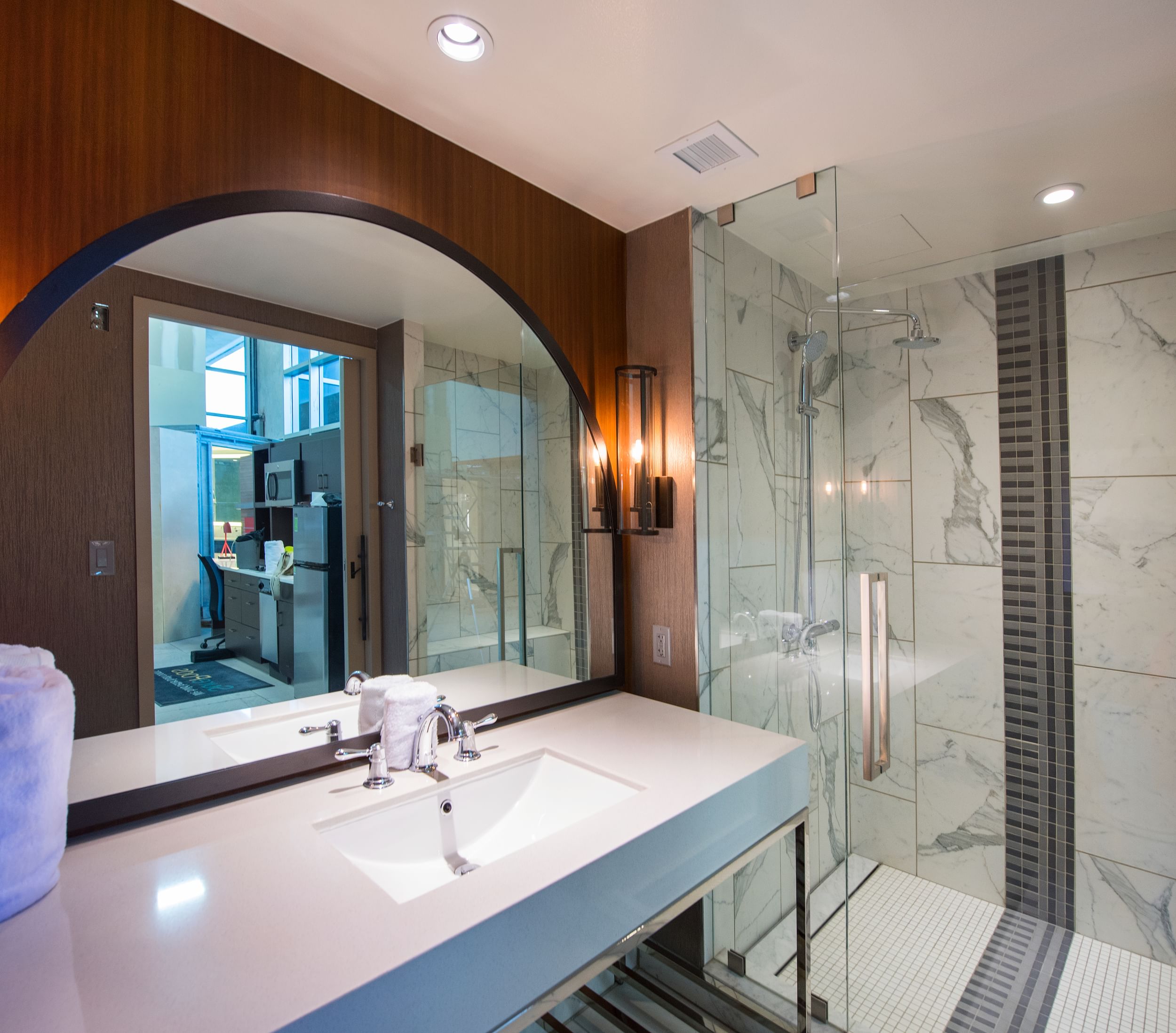 Inside fancy bathroom vanity and shower