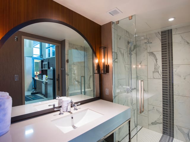 Inside fancy bathroom vanity and shower