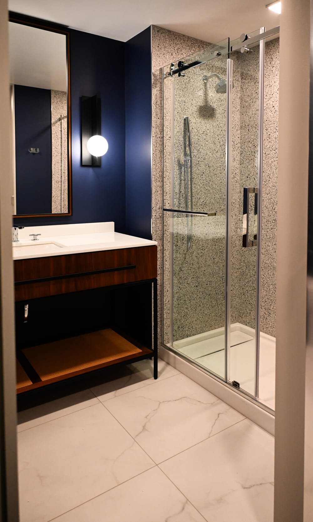 Interior shot of bathroom with blue wall