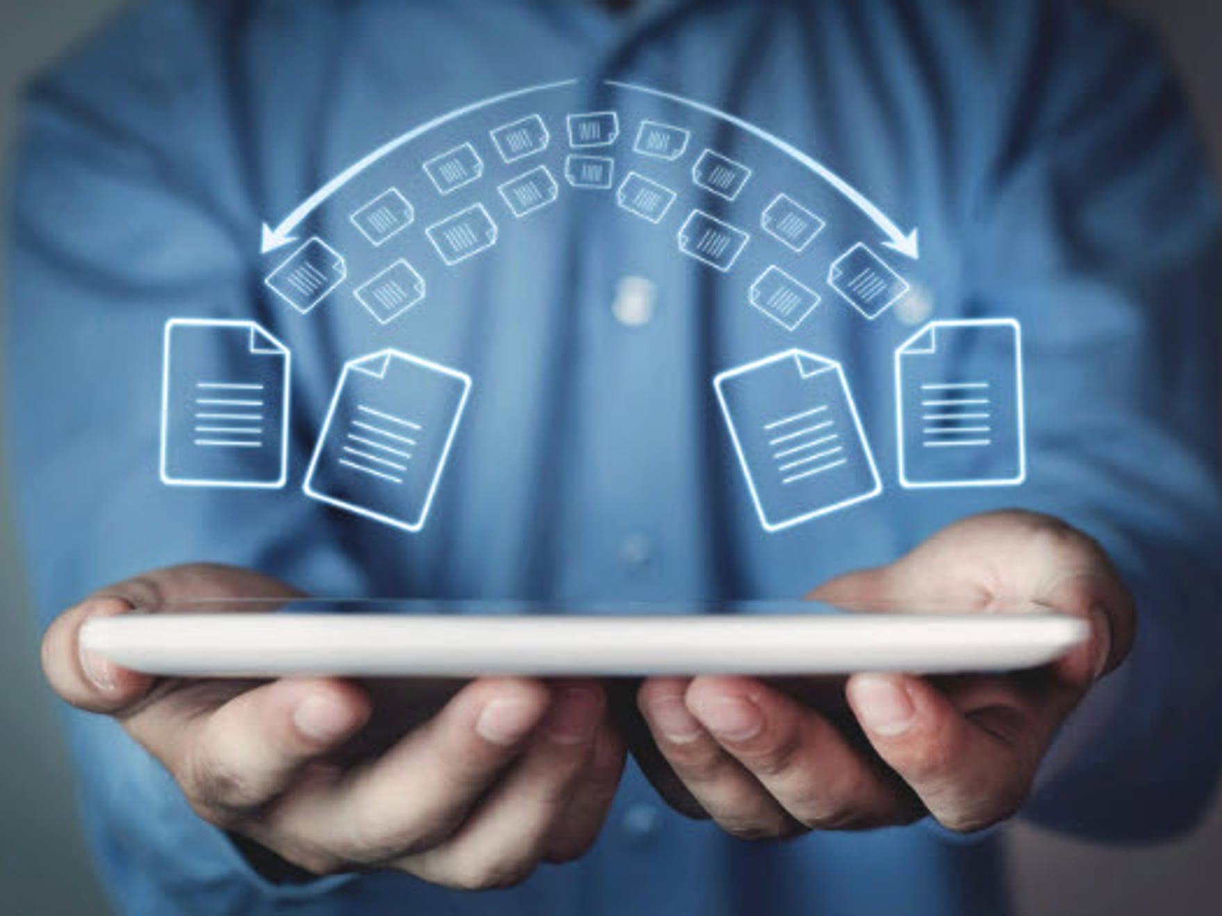 A man holding a digital tablet.